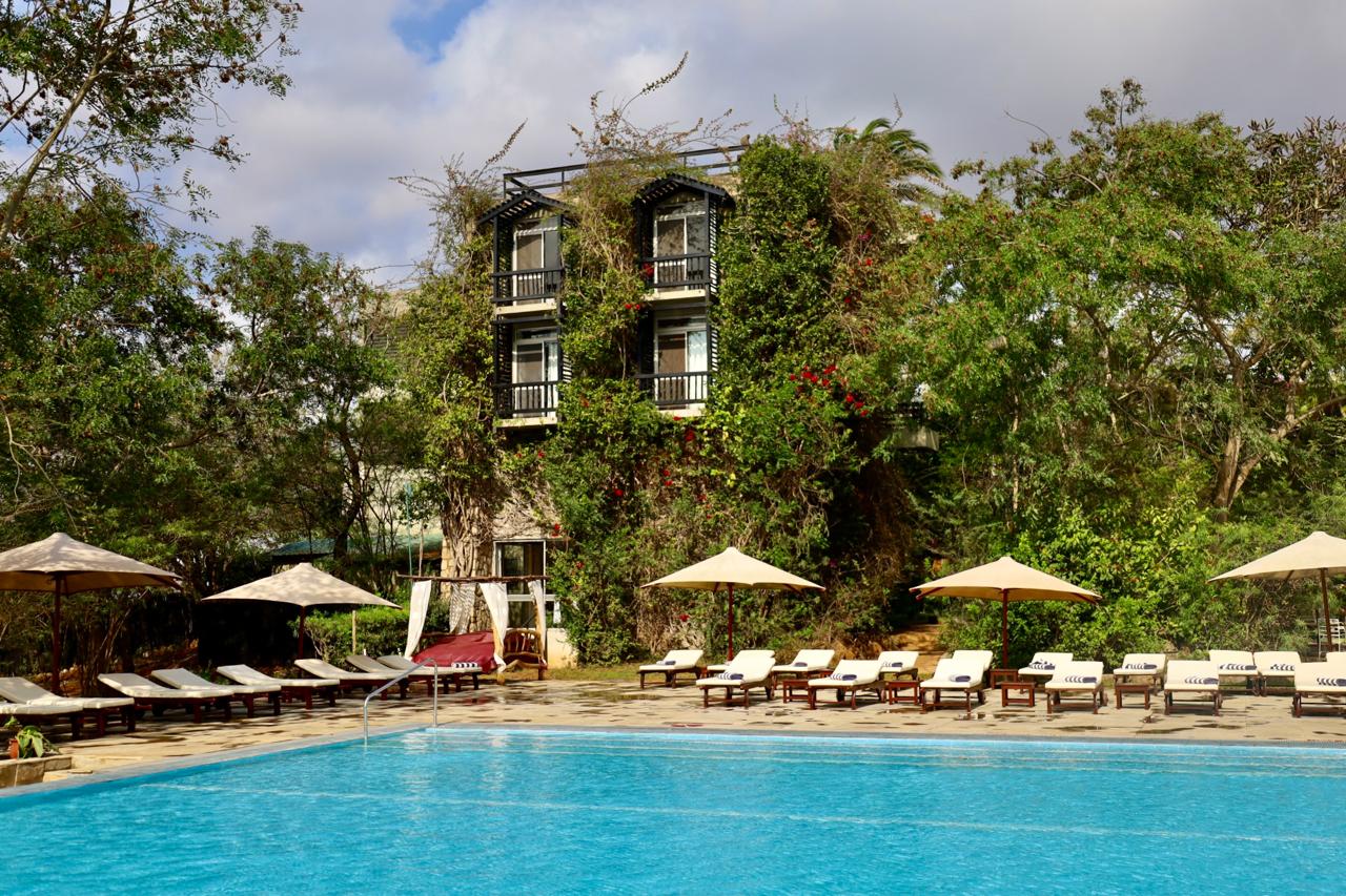 Swimming pool beside the resort building at Taita Hills Safari Resort & Spa