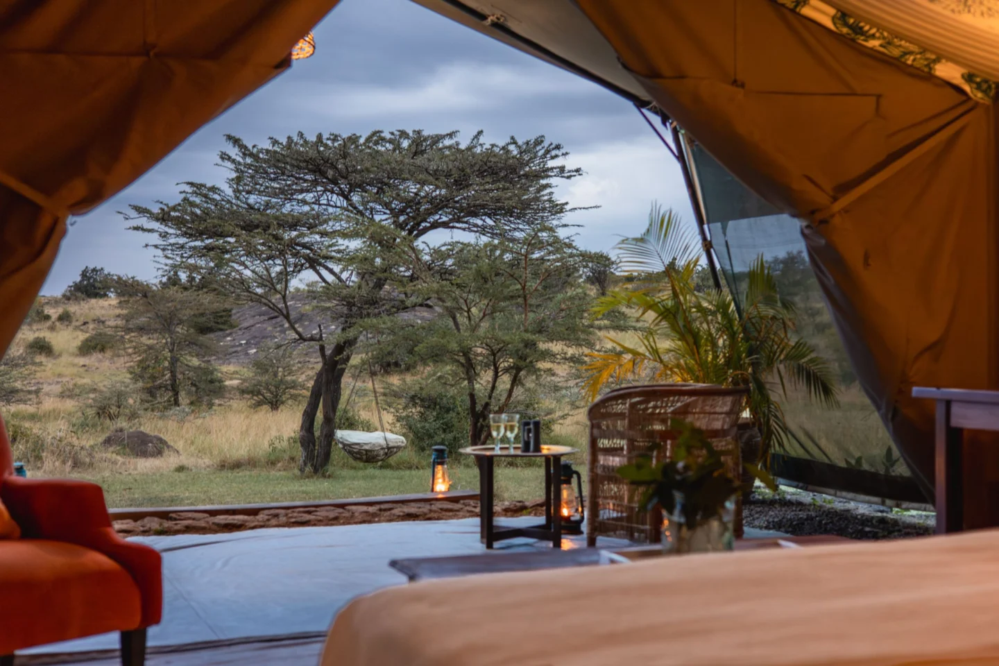 View from a safari tent across the bush at Hemingways River Camp Mara