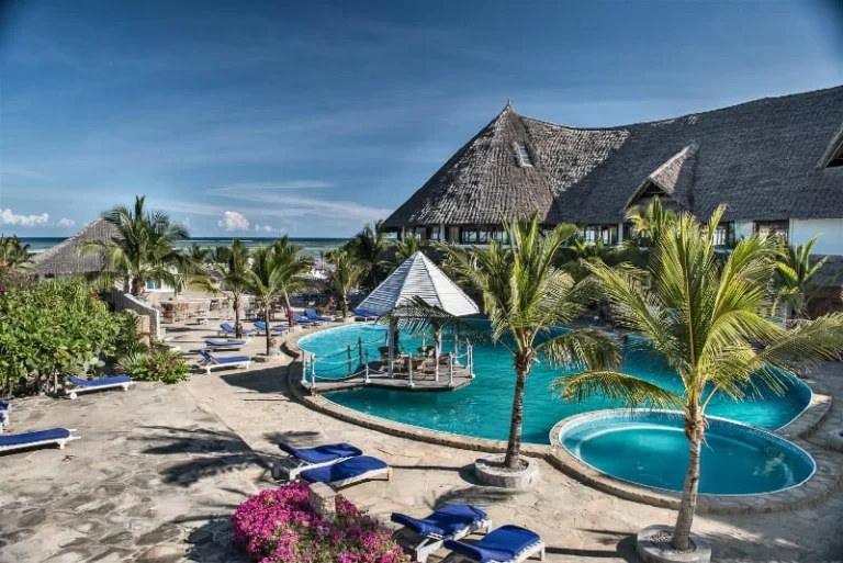 Swimming pools and palm trees at Jacaranda Watamu