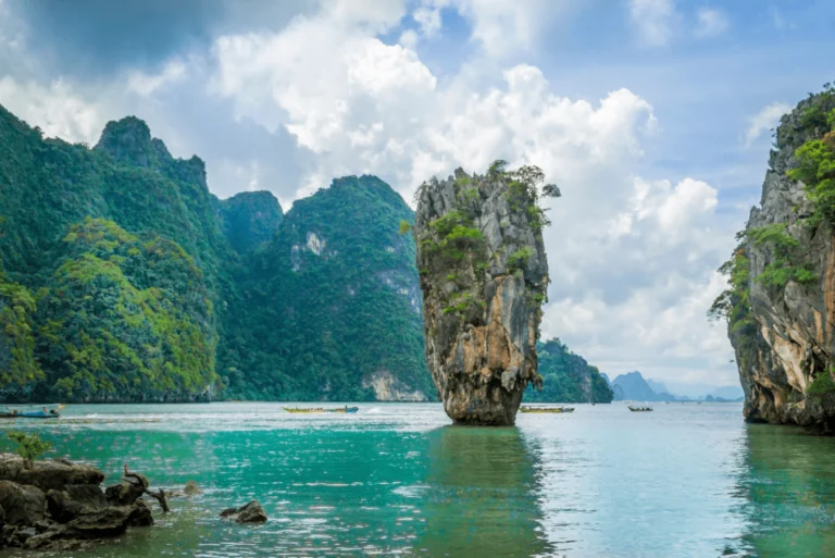 Tall limestone island rising from the sea in Thailand