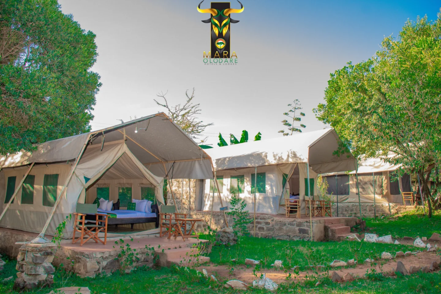 Safari tent and outdoor seating area at Mara Olodare Camp