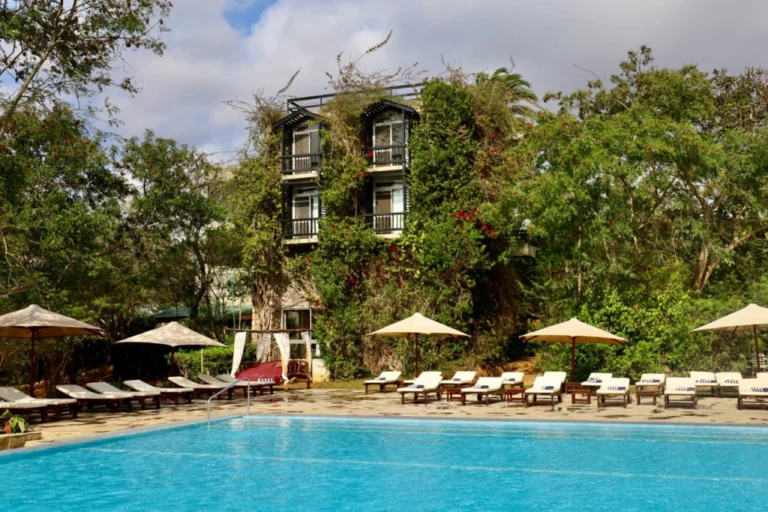 Swimming pool beside the resort building at Taita Hills Safari Resort & Spa
