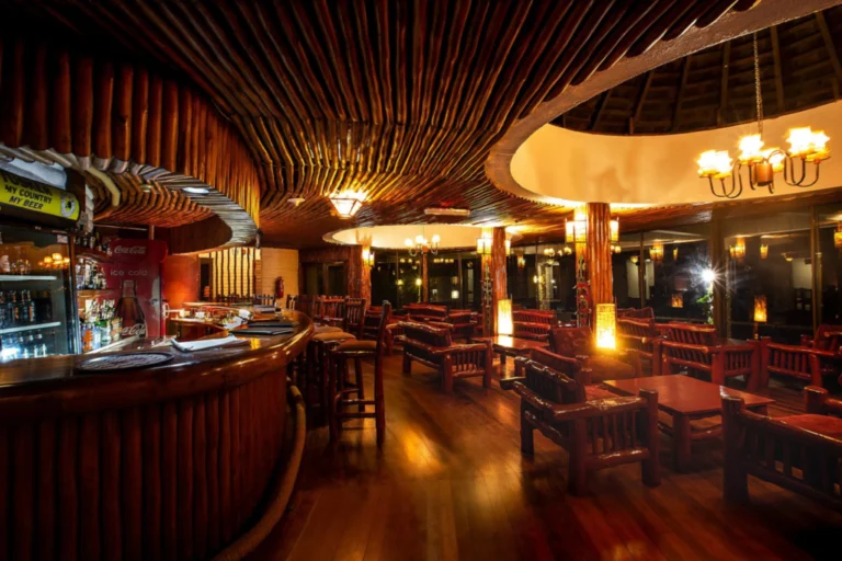 Warmly lit lodge bar at Salt Lick Safari Lodge