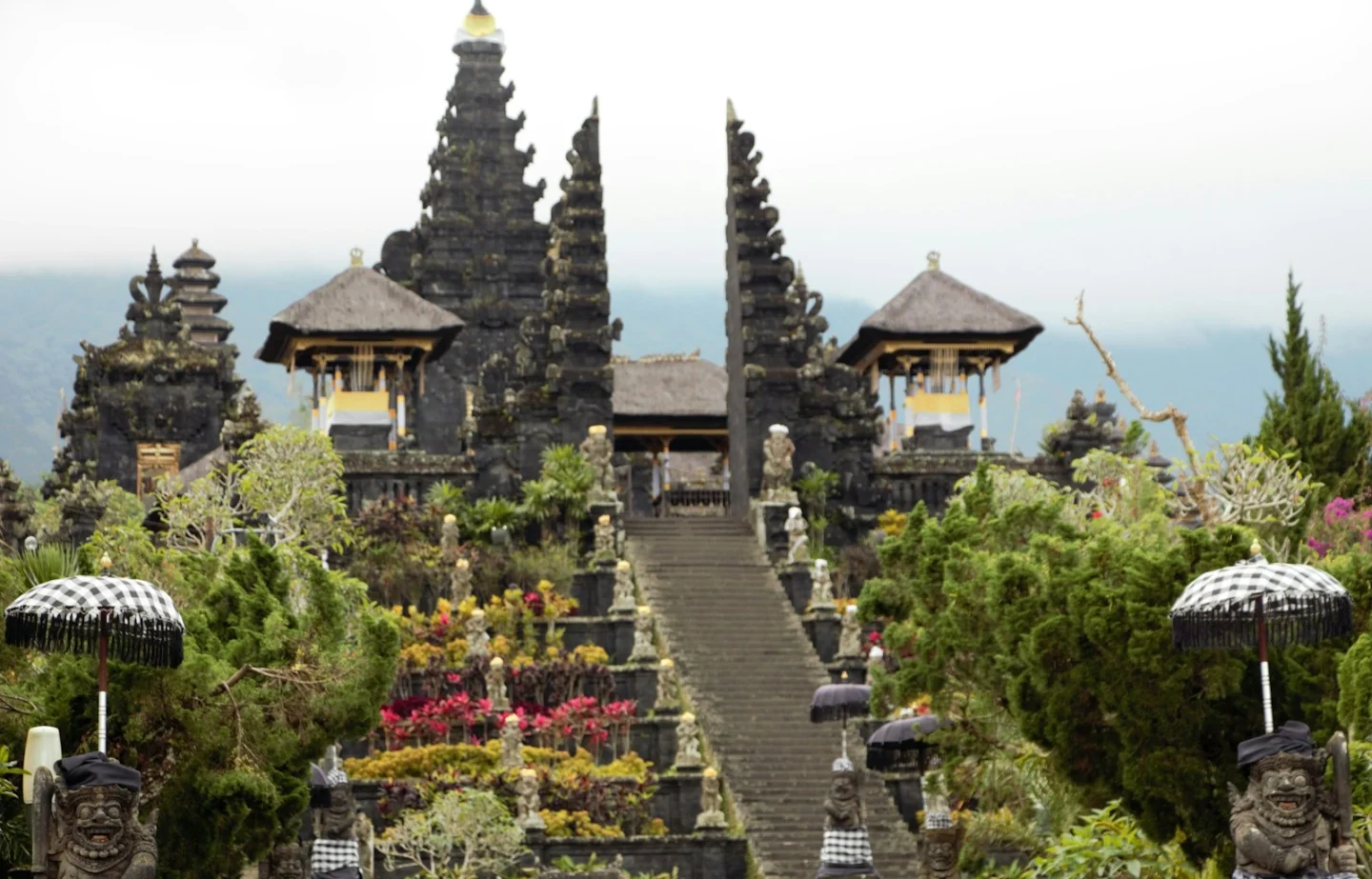 Balinese temple with tiered roofs and stone steps in Indonesia